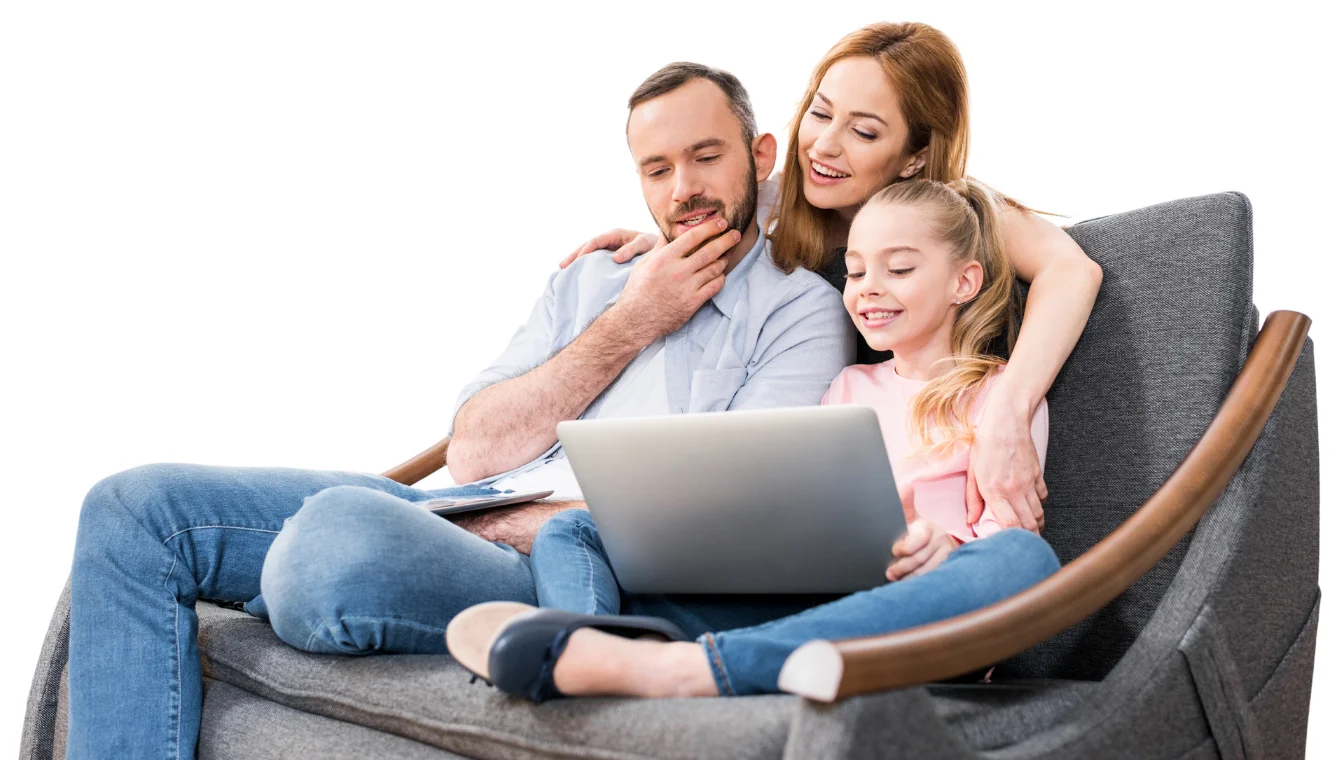 Mum, dad and daughter sitting on sofa watching memories from laptop